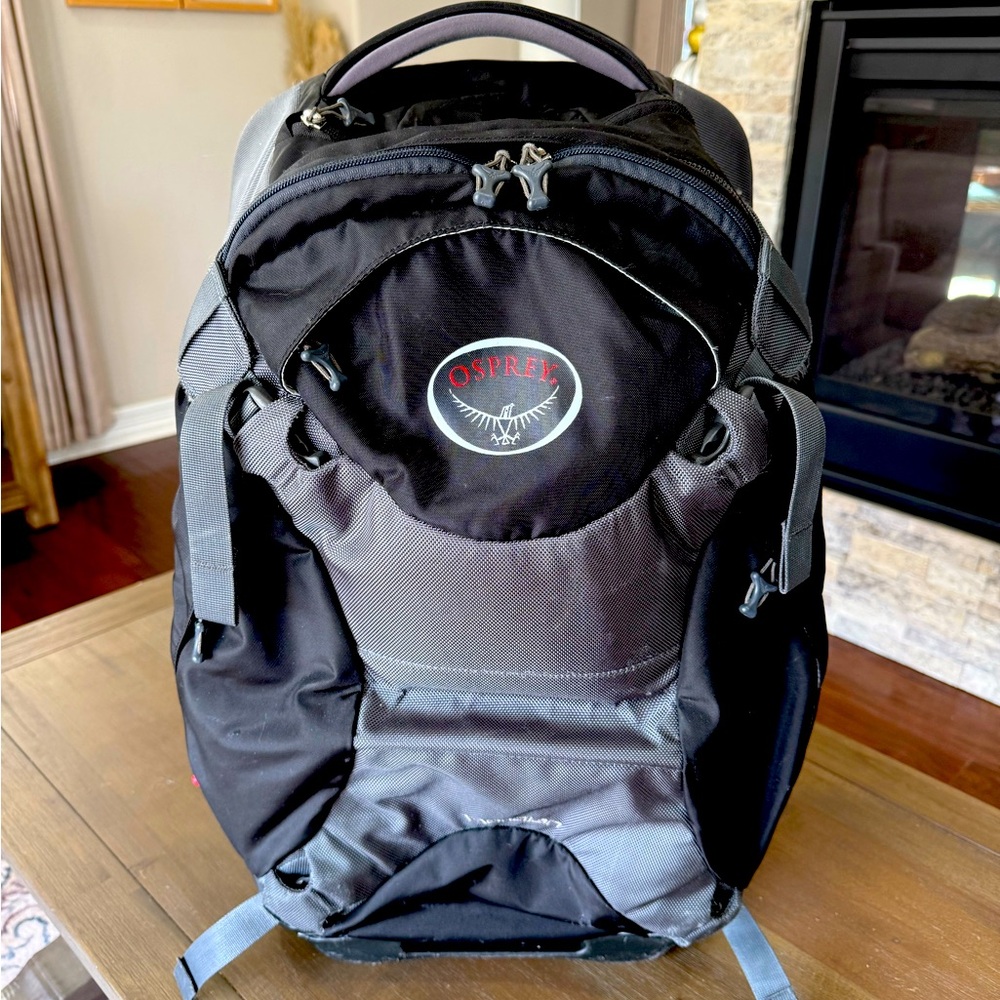 Black and Grey OSPREY MERIDIAN ROLLING LUGGAGE / BACKPACK COMBO!